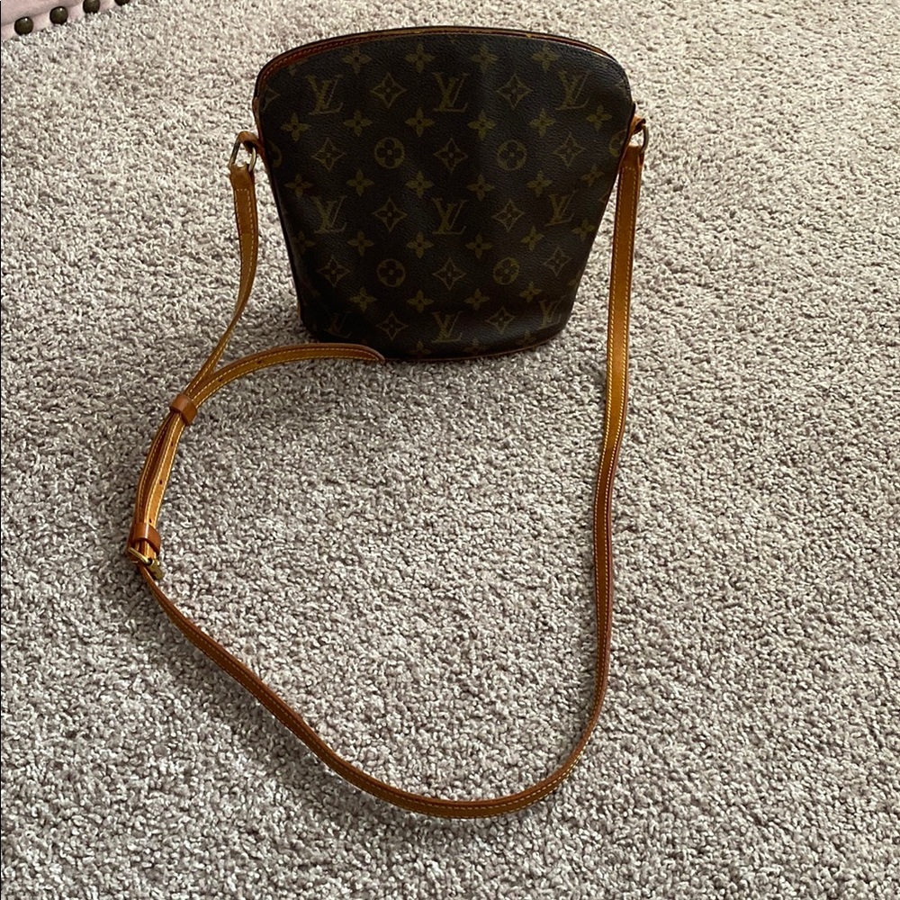 Louis Vuitton Brown Crossbody Bag with Bucket Shape and Textured Fabric